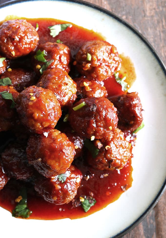 Slow Cooker Sweet and Spicy Meatballs » The Thirsty Feast