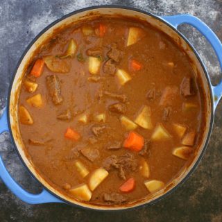 This pumpkin beef stew recipe is the perfect meal for cool autumn nights. It is savory, hearty and guaranteed to warm you up! Pair it with a glass of Nero d'Avola, one of my favorite Sicilian wines. | honeyandbirch.com