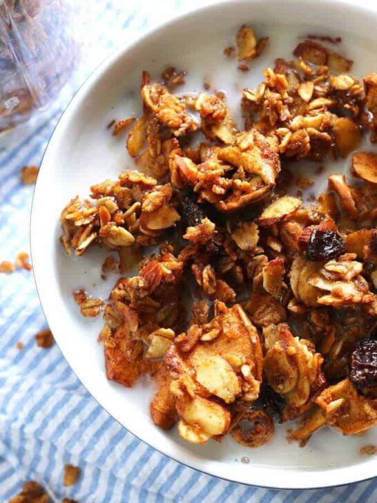 Apple cinnamon raisin granola is the perfect homemade snack or breakfast! It's super easy to make and delicious! | honeyandbirch.com