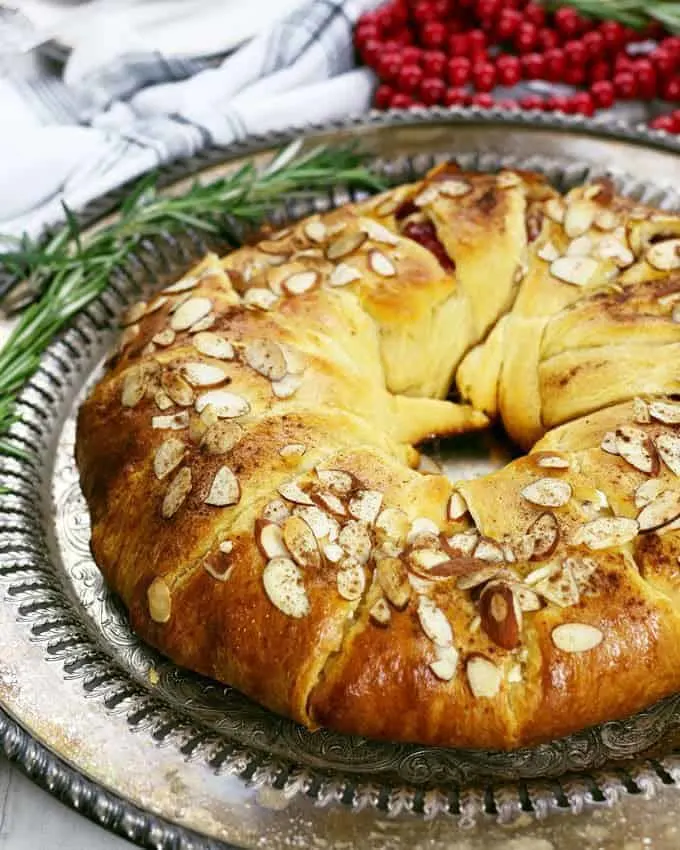 cranberry goat cheese Christmas wreath appetizer on a serving tray