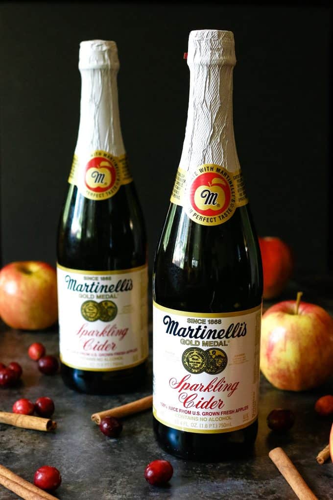 two bottles of sparkling apple cider