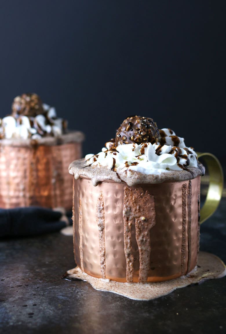 Nutella and Ferrero Rocher candies go so well together. That's why I combined them in this Nutella Ferrer Rocher milkshake. | honeyandbirch.com