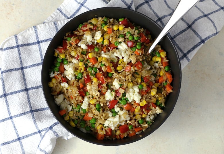 Enjoy this veggie fried rice when you are looking for an extra dose of vegetables for lunch. It's made healthier with brown rice and egg whites! | honeyandbirch.com