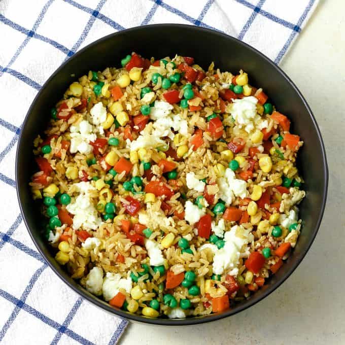 veggie fried rice in a grey bowl
