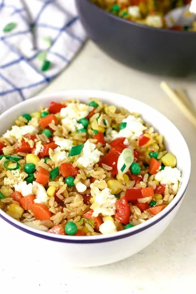 vegetable fried rice in a white bowl
