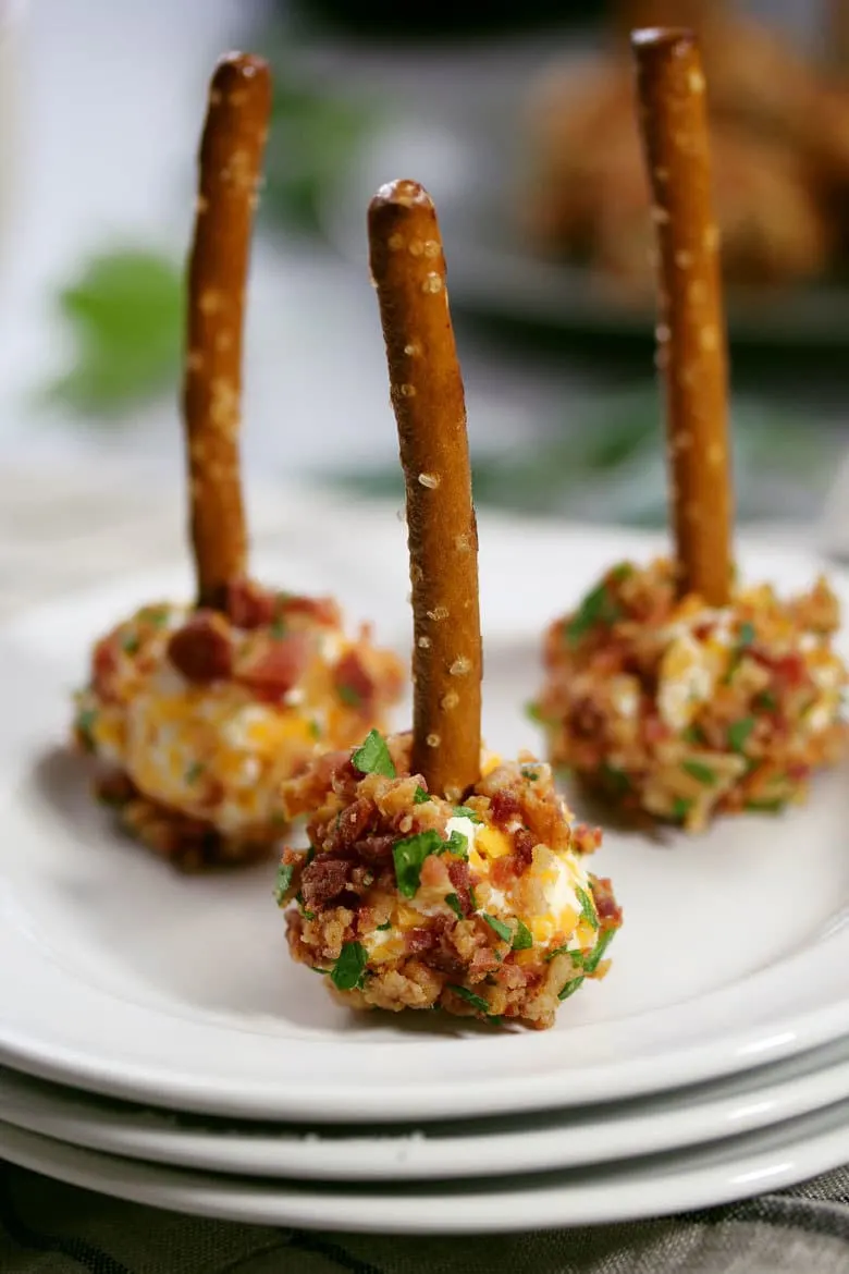 mini bacon ranch cheese ball on small white plate