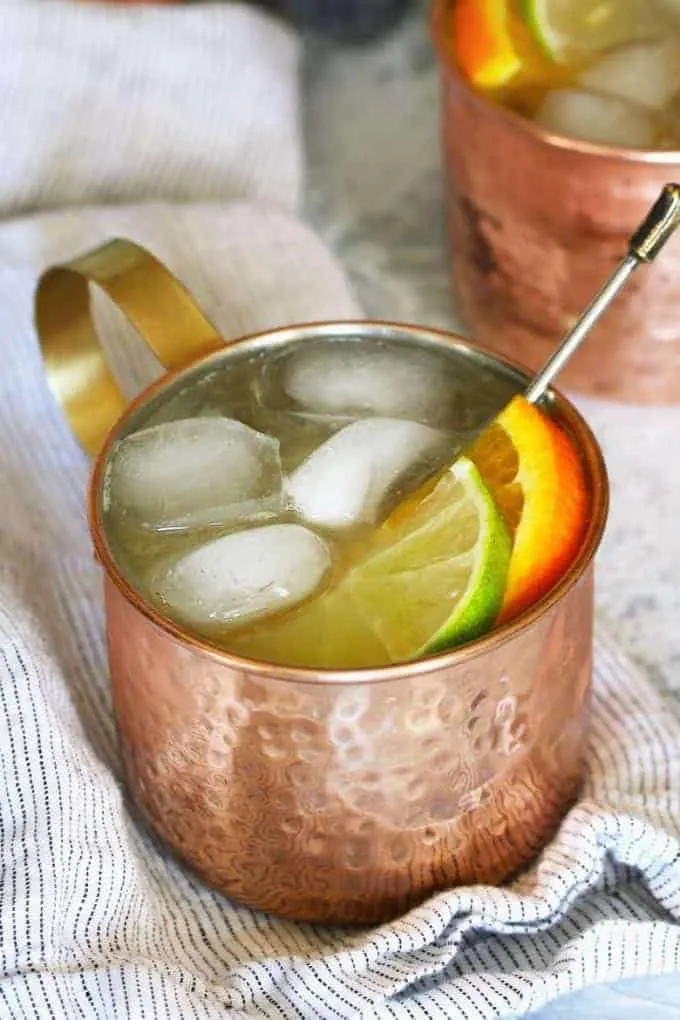 orange Moscow mule in a copper mug