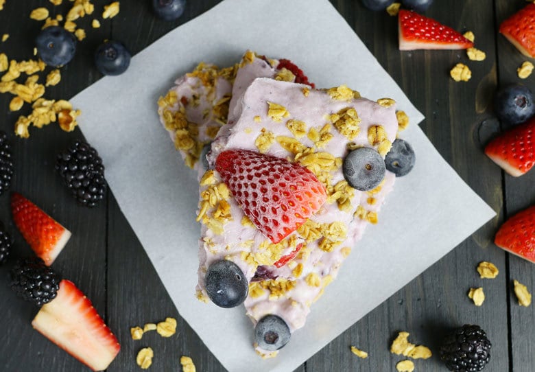 This triple berry granola frozen yogurt breakfast bark is perfect for busy mornings. It's like eating a make-ahead breakfast parfait popsicle and is great for feeding a crowd! Bark from up top.