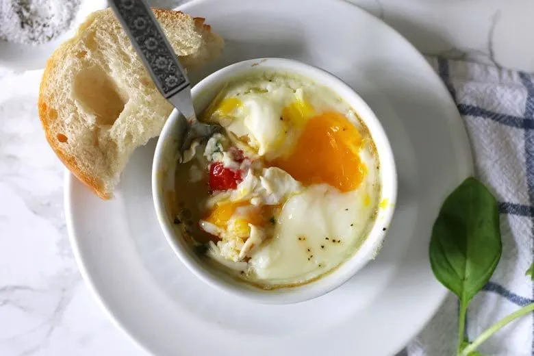 Caprese baked eggs only require 4 ingredients and a little salt and pepper. This easy recipe is going to become your go-to quick recipe for breakfast or brunch!