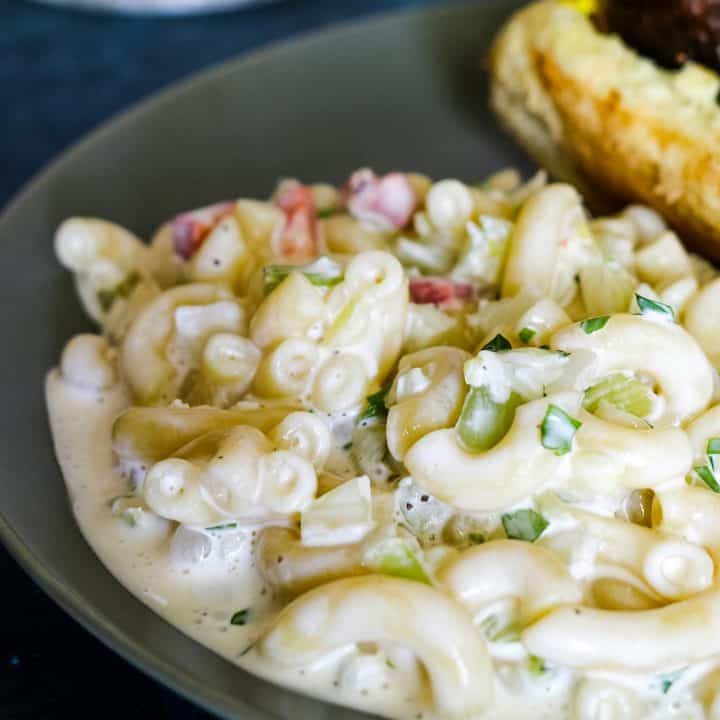 macaroni salad on a grey plate