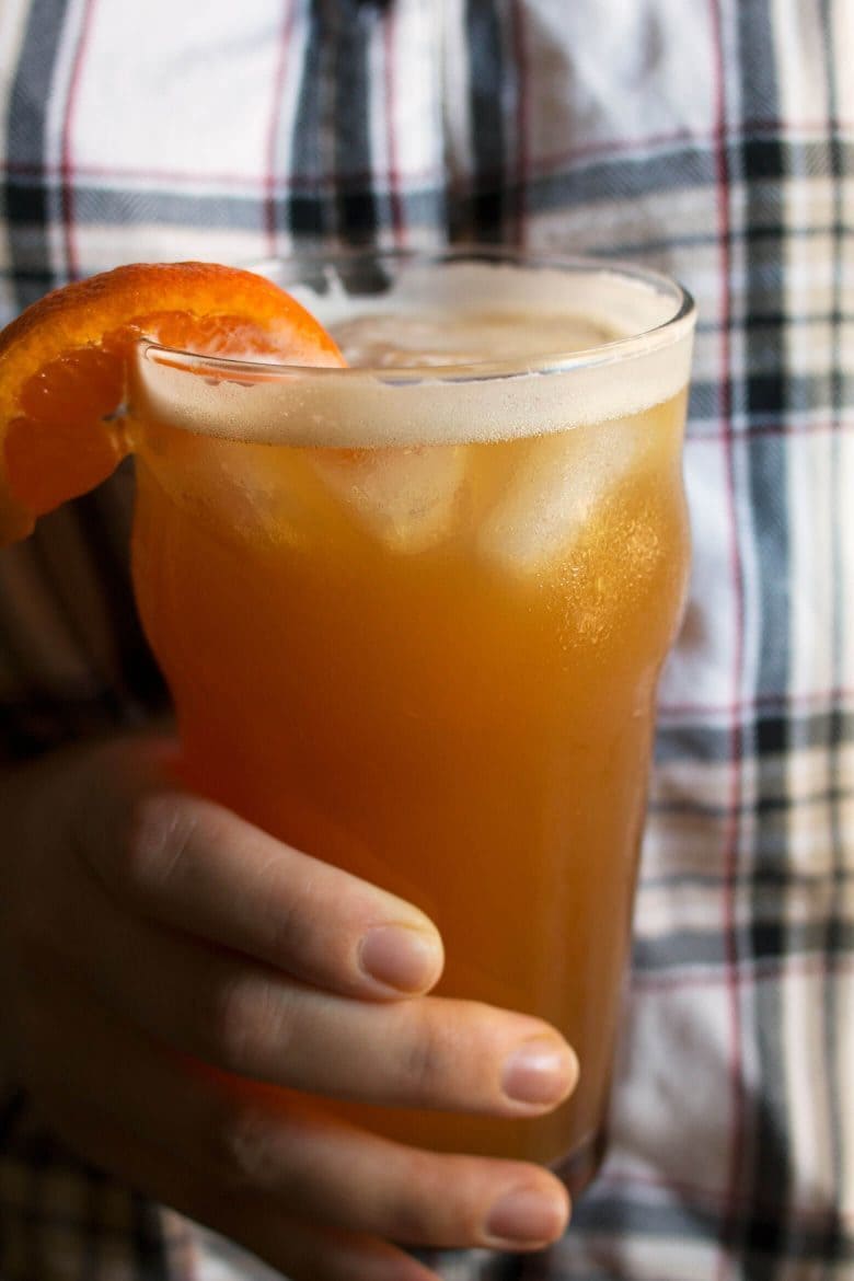 This orange bourbon beer cocktail is your new favorite summer drink. Pair it with a burger or some Italian sausage for a great summer BBQ.