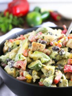 This grilled chicken avocado salad is topped with homemade jalapeno cilantro dressing. It is the perfect easy