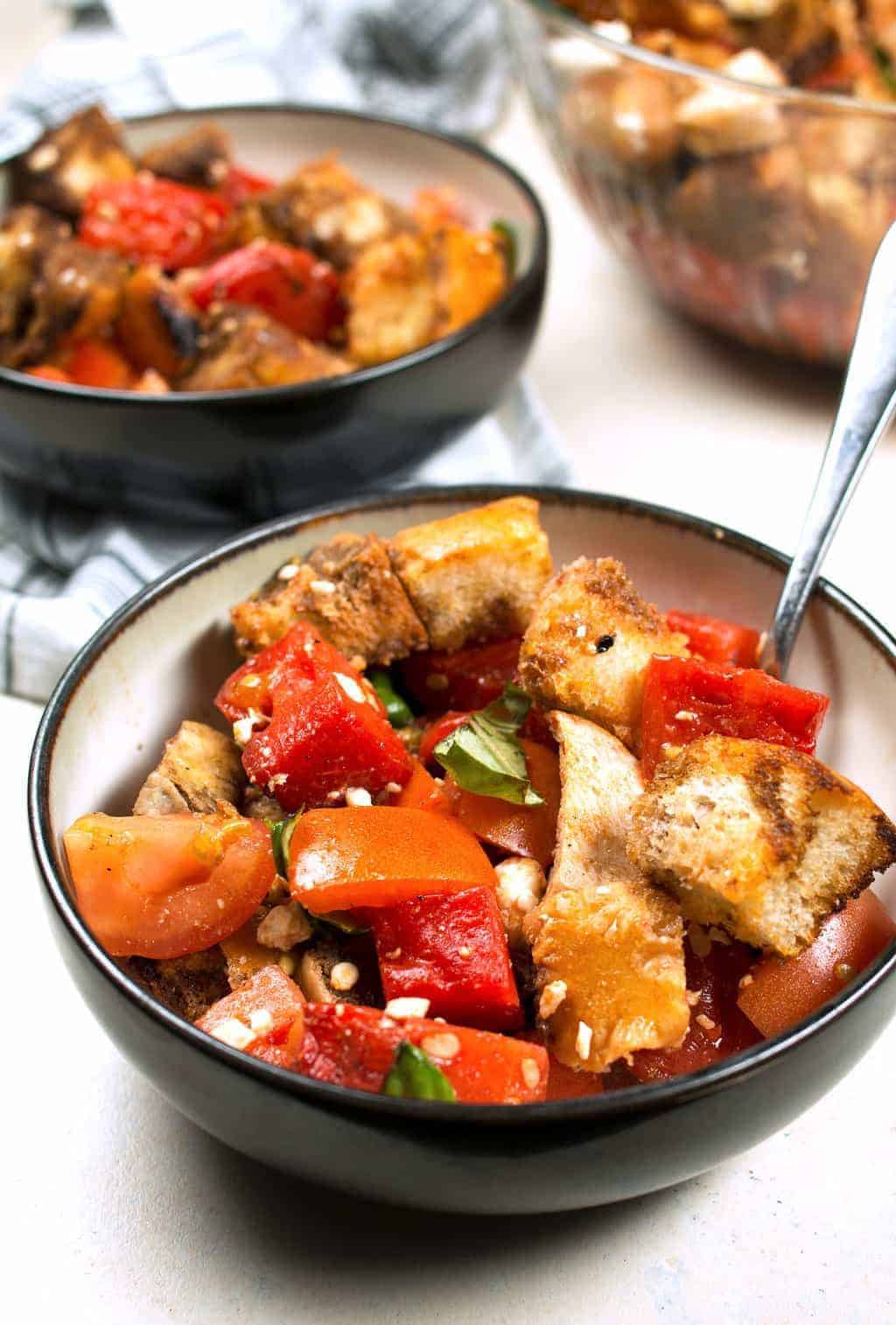 Grilled watermelon chicken panzanella salad is a great unique addition to any summer barbecue! It's easy to make and full of color and flavor.