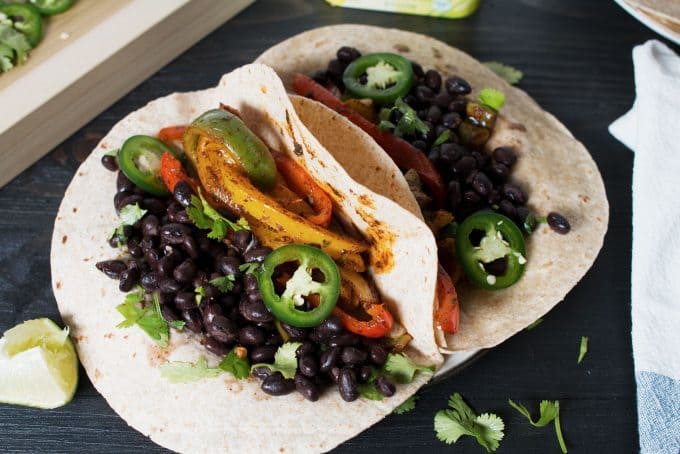 This recipe for vegan black bean fajitas will have you changing your mind about vegan food. Not only is it delicious and filling, it's also better for you!