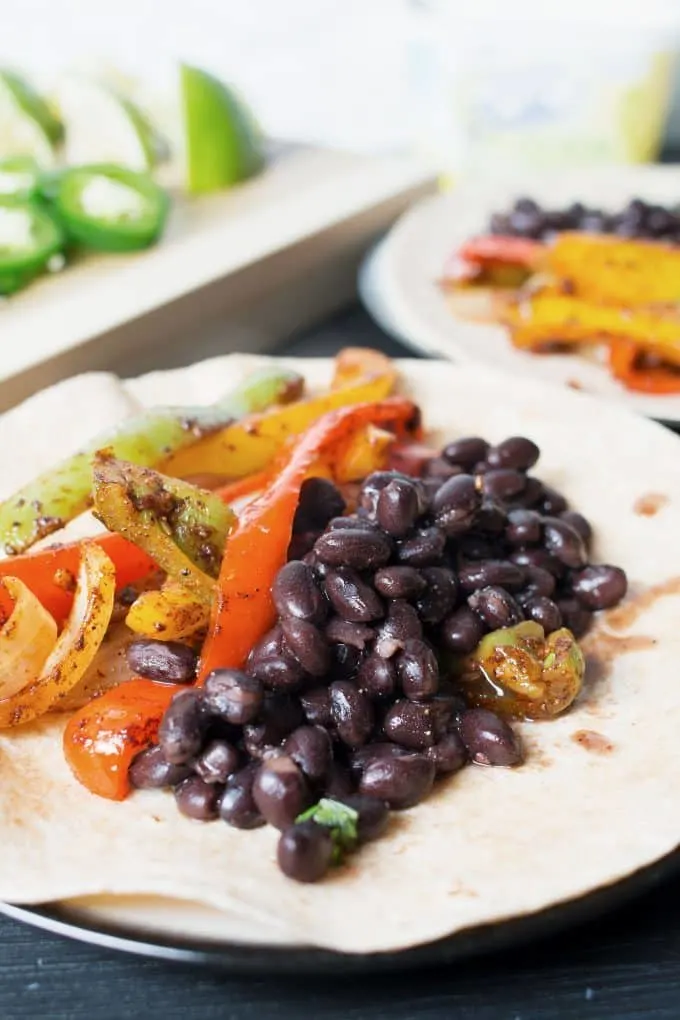 This recipe for vegan black bean fajitas will have you changing your mind about vegan food. Not only is it delicious and filling, it's also better for you!