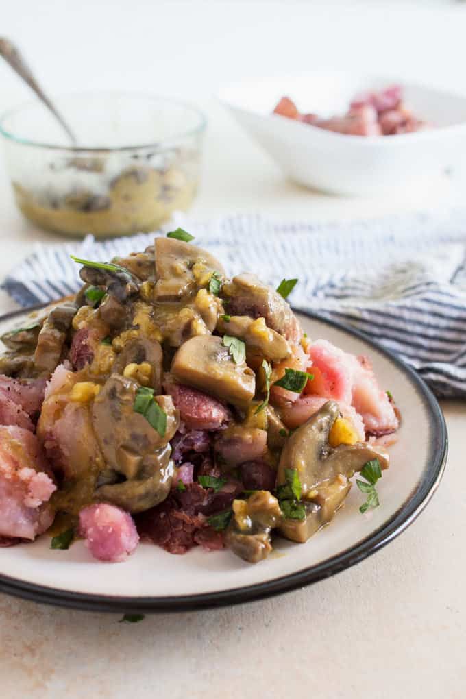 These Smashed Potatoes with Vegan Mushroom Gravy are the perfect vegan alternative to mashed potatoes and gravy. Easy to make and delicious!