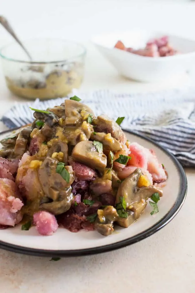 These Smashed Potatoes with Vegan Mushroom Gravy are the perfect vegan alternative to mashed potatoes and gravy. Easy to make and delicious!