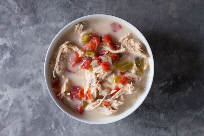This Chicken Fajita Soup is made in the slow cooker; perfect for busy families and cool nights!