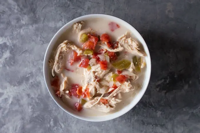 This Chicken Fajita Soup is made in the slow cooker; perfect for busy families and cool nights!