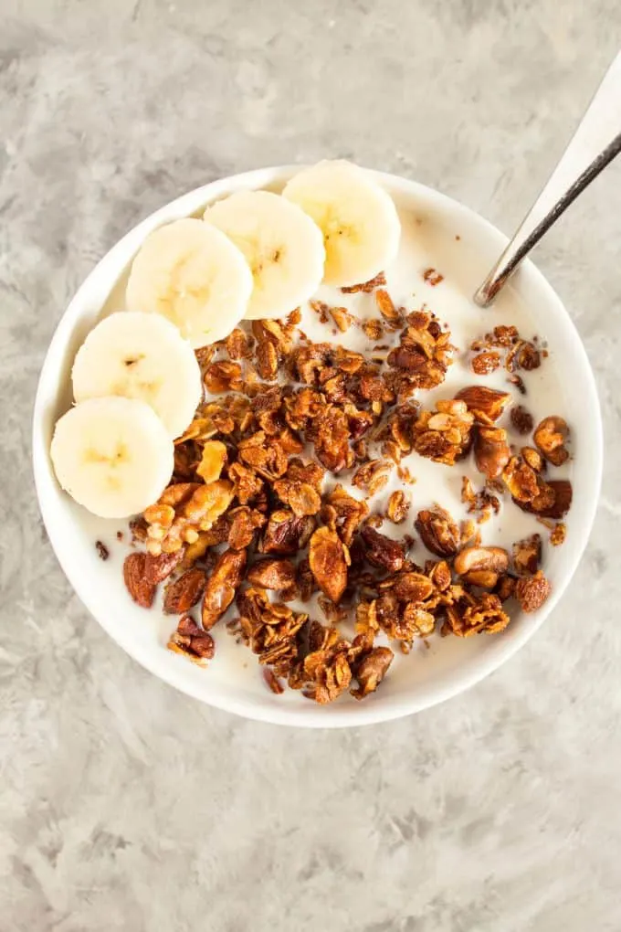 This make-ahead honey nut granola is the perfect easy breakfast! Mix up a batch and then eat it with milk or as a parfait.