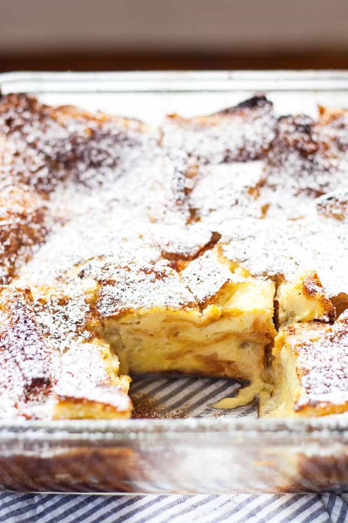 Baked vanilla French toast is the perfect lazy Sunday morning breakfast. Prep the whole dish the day before and then pop it into the oven in the morning!