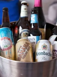 beer bottles and cans in a galvanized tub