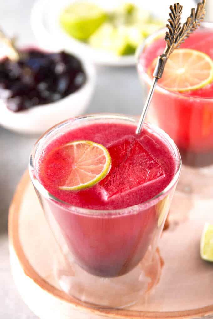 blackberry Moscow mule with a cocktail stirrer