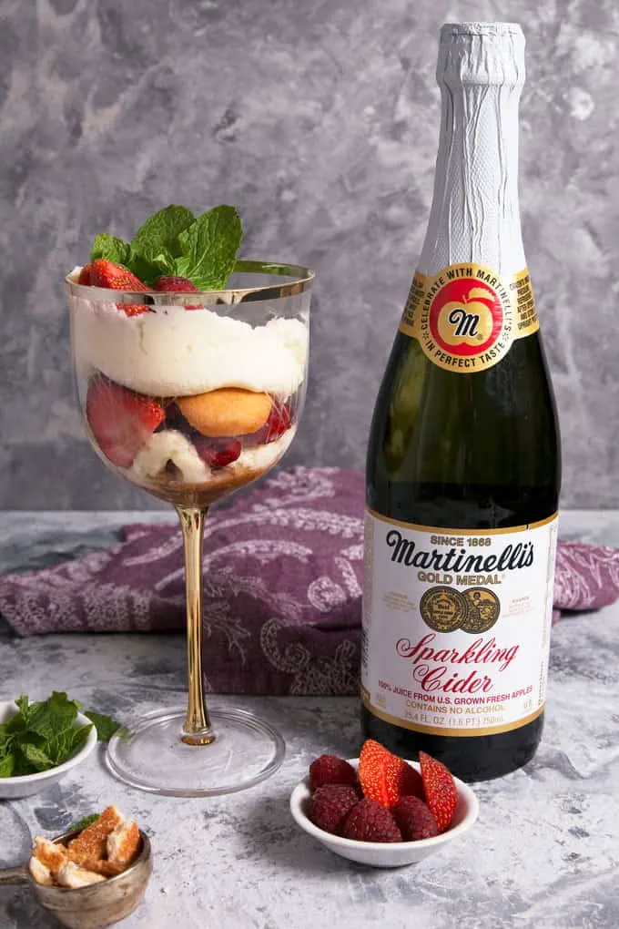 Raspberry Strawberry Parfaits with Sparkling Cider Frosting with a bottle of Martinelli's sparkling cider