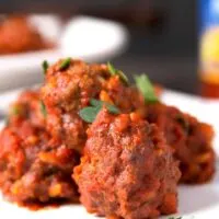 6 porcupine meatballs on a plate