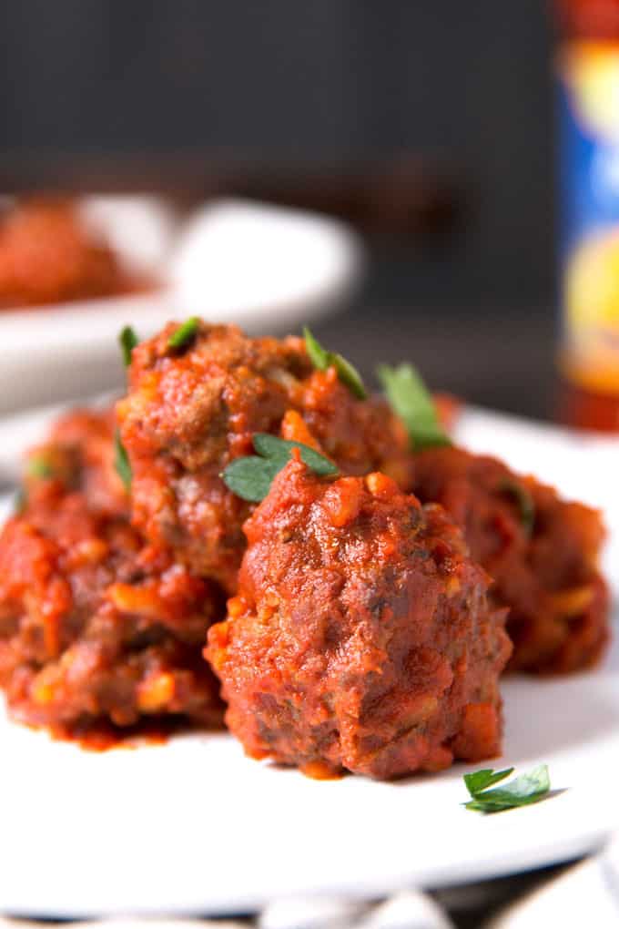 6 porcupine meatballs on a plate