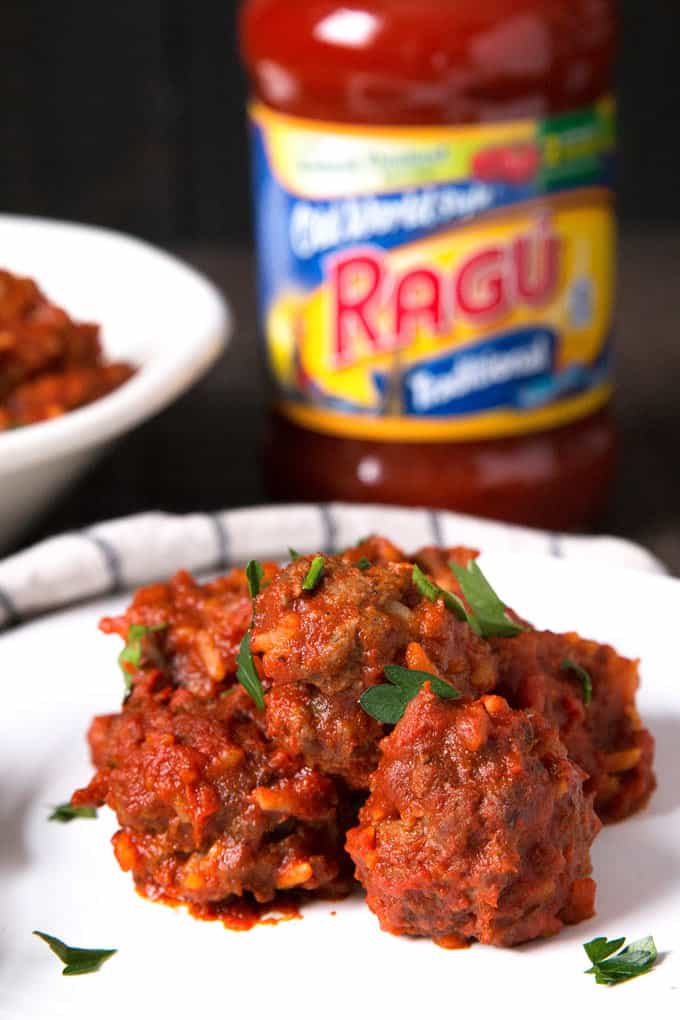 meatballs with RAGU jar in background