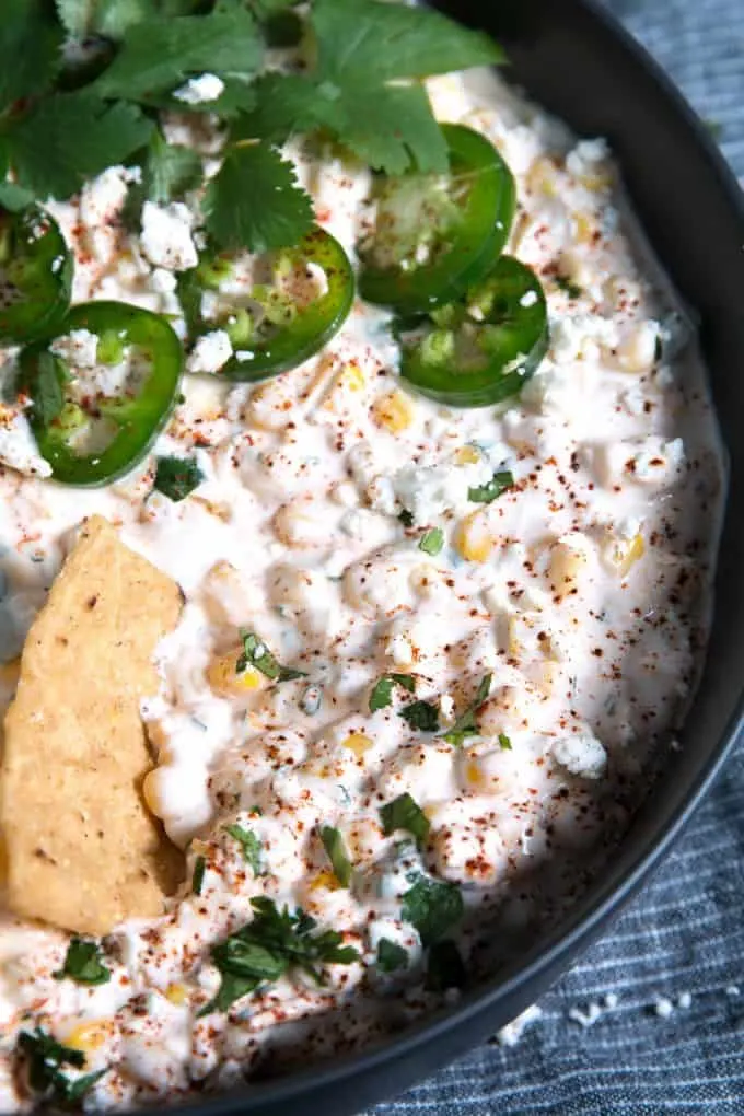 corn dip with a tortilla chip