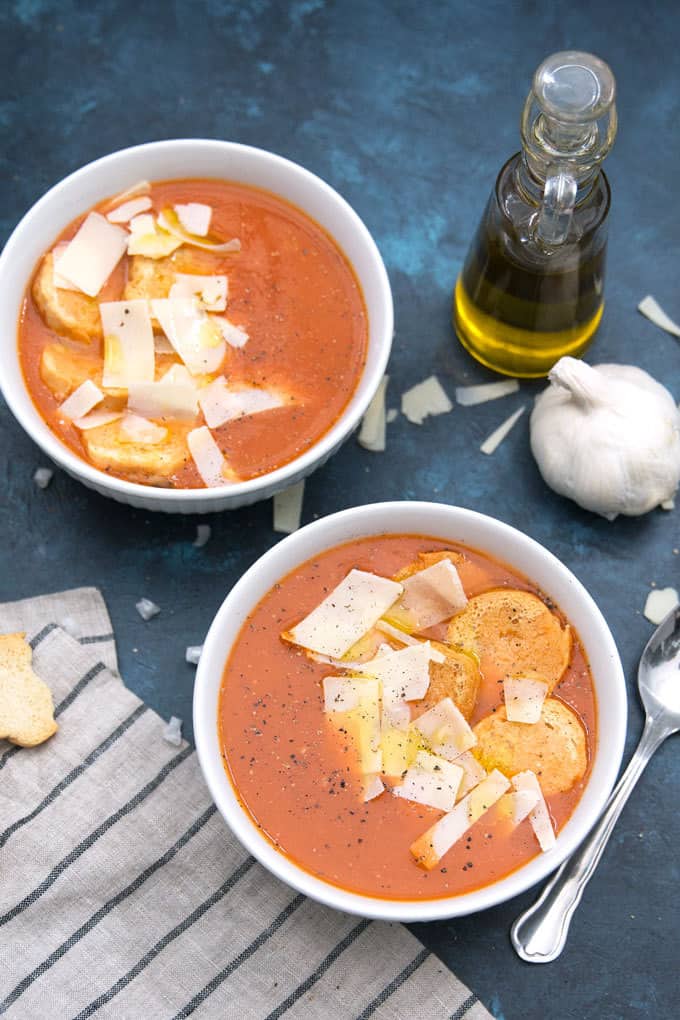 picture of two bowls of roasted garlic tomato soup