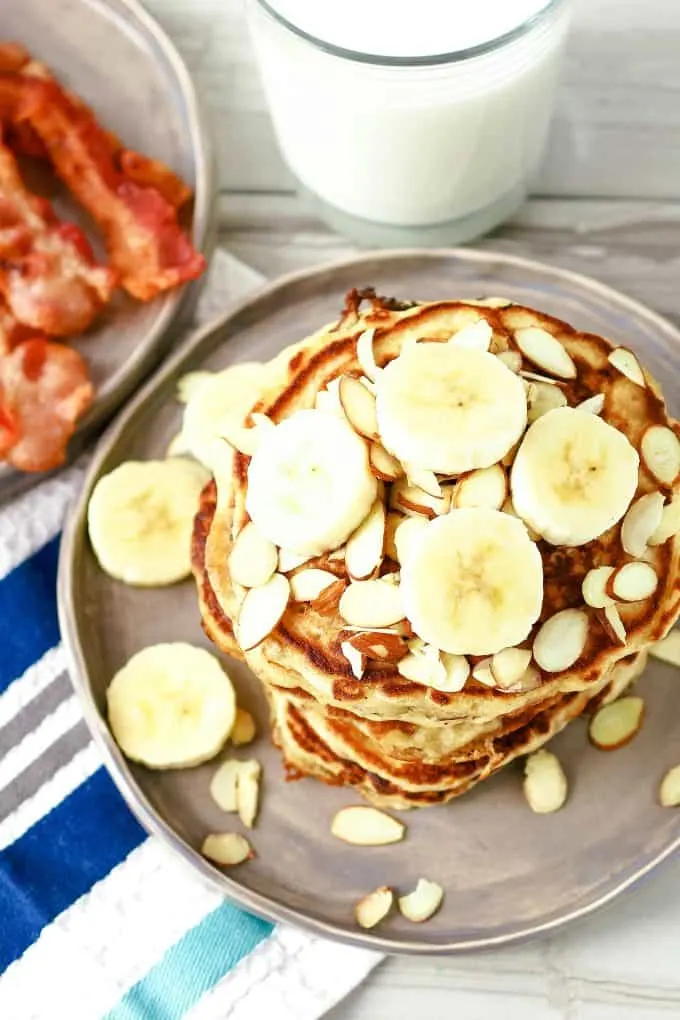 overhead image of plate of almond banana pancakes