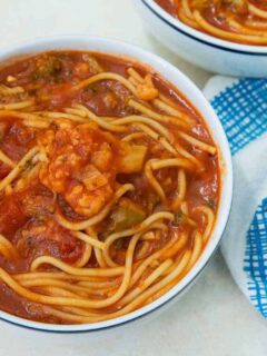 instant pot spaghetti soup in a white bowl
