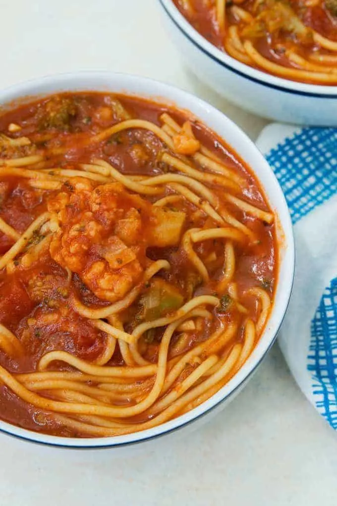 instant pot spaghetti soup in a white bowl