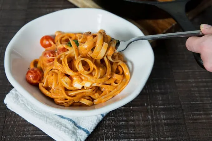 Rosa Chicken Caprese Pasta on a fork