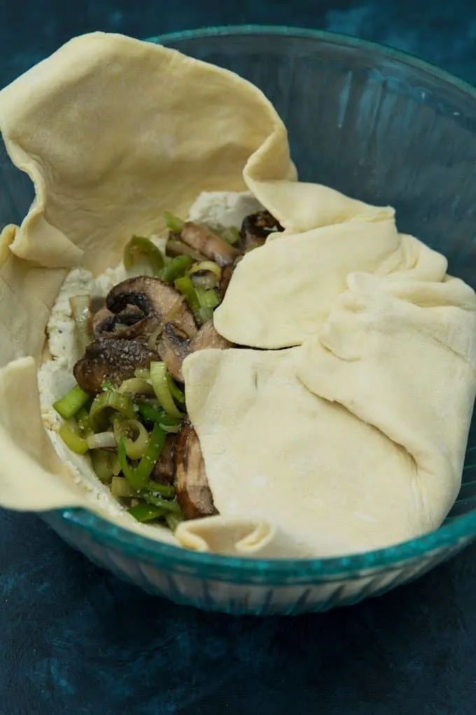 photo of leek mushroom cheese stuffed puff pastry preparation