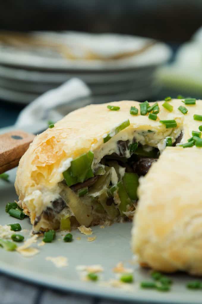 leek mushroom cheese stuffed puff pastry with slice missing