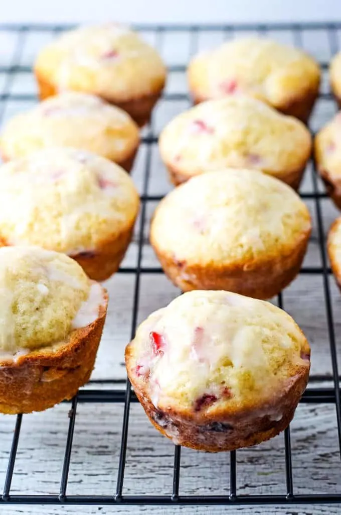 strawberry muffins on a cooling rack