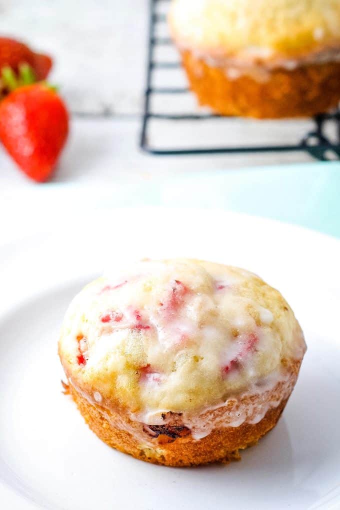 strawberry muffin on a white plate