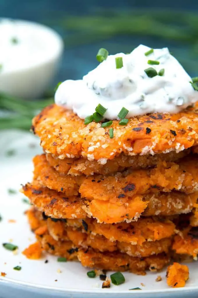 sweet potato pancakes topped with chive dipping sauce