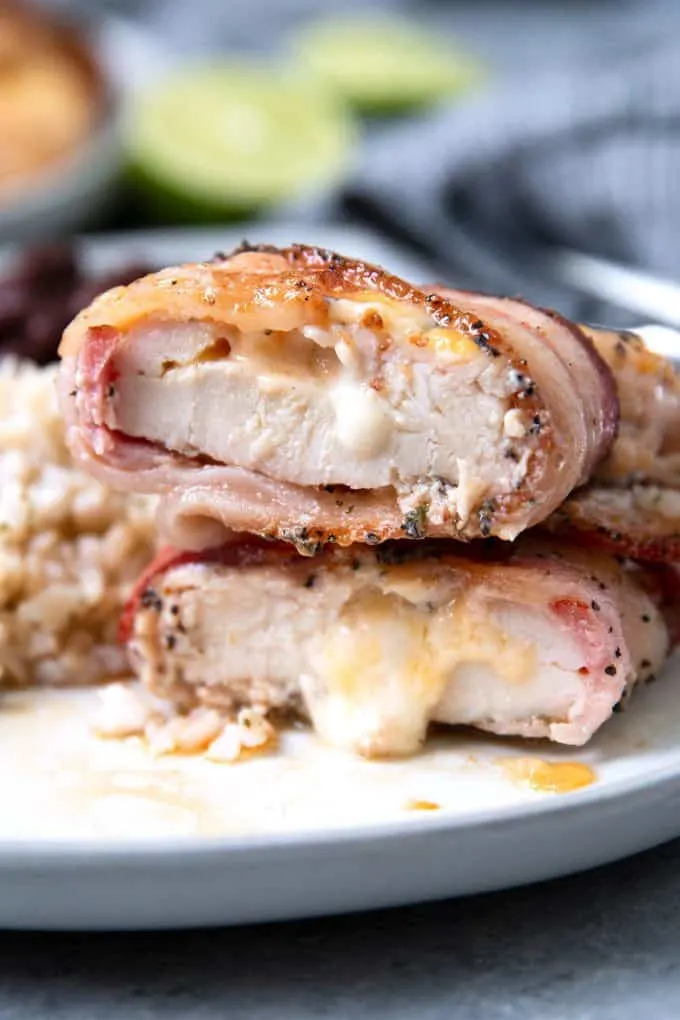 photo of cilantro lime chicken breast stuffed with cheese and wrapped in bacon