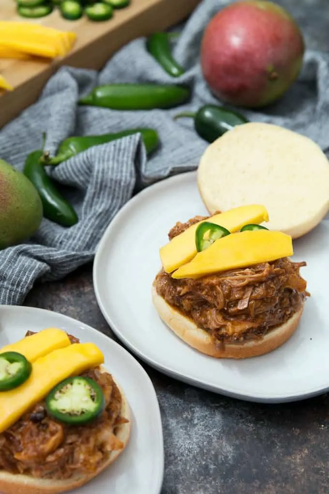 two mango pulled pork sandwiches
