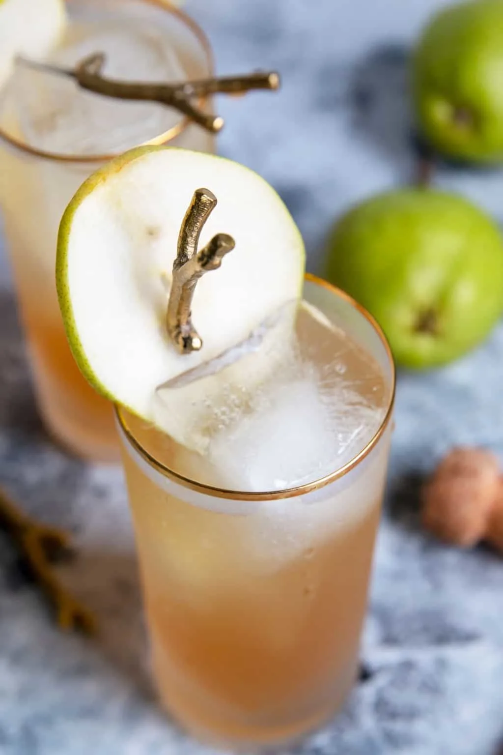 pear garnish in a sparkling bourbon pear cocktail