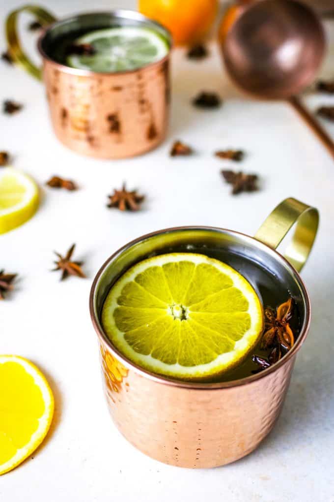 two mugs of ginger citrus punch