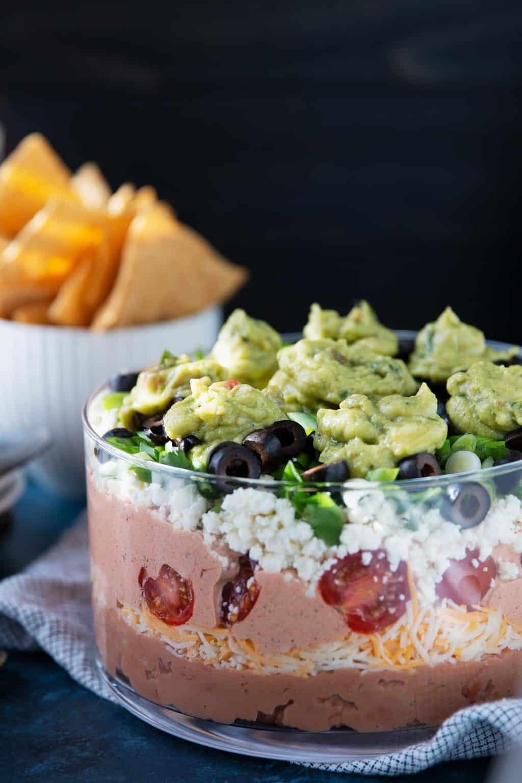 7Layer Bean Dip Recipe » The Thirsty Feast by honey and birch
