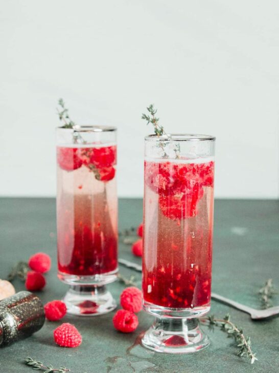 2 raspberry kir royale cocktails in tall glasses