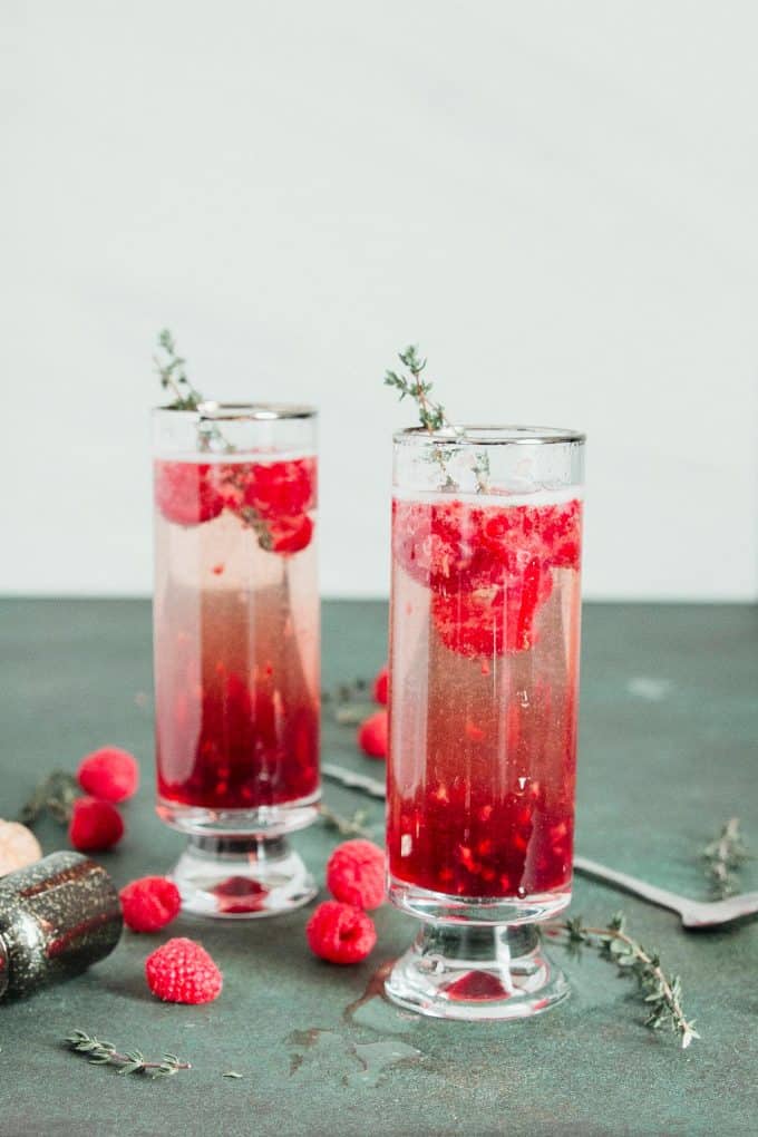 2 raspberry kir royale cocktails in tall glasses