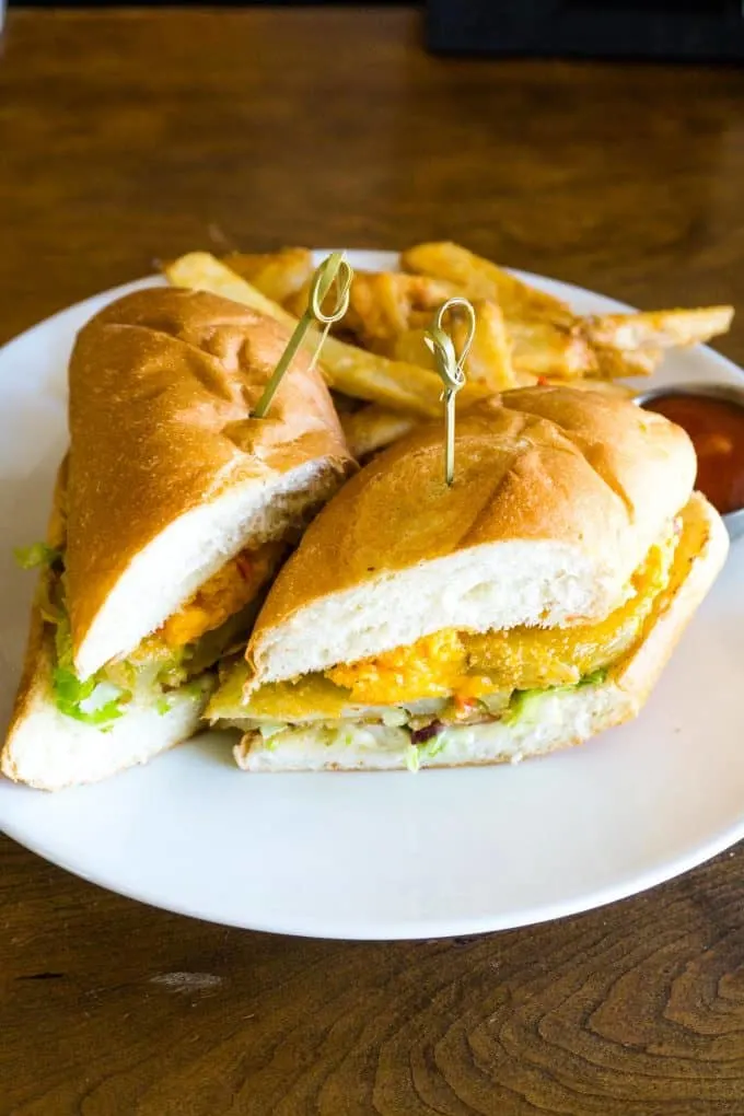 The Best Downtown Charleston Restaurants - Amen Street Fish and Raw Bar fried green tomato sandwich